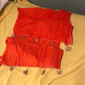 Orange scarf with tassels